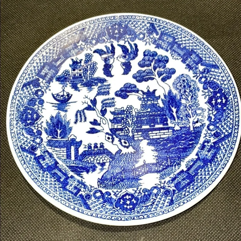 Blue and White Porcelain Dinnerware with Intricate Pattern